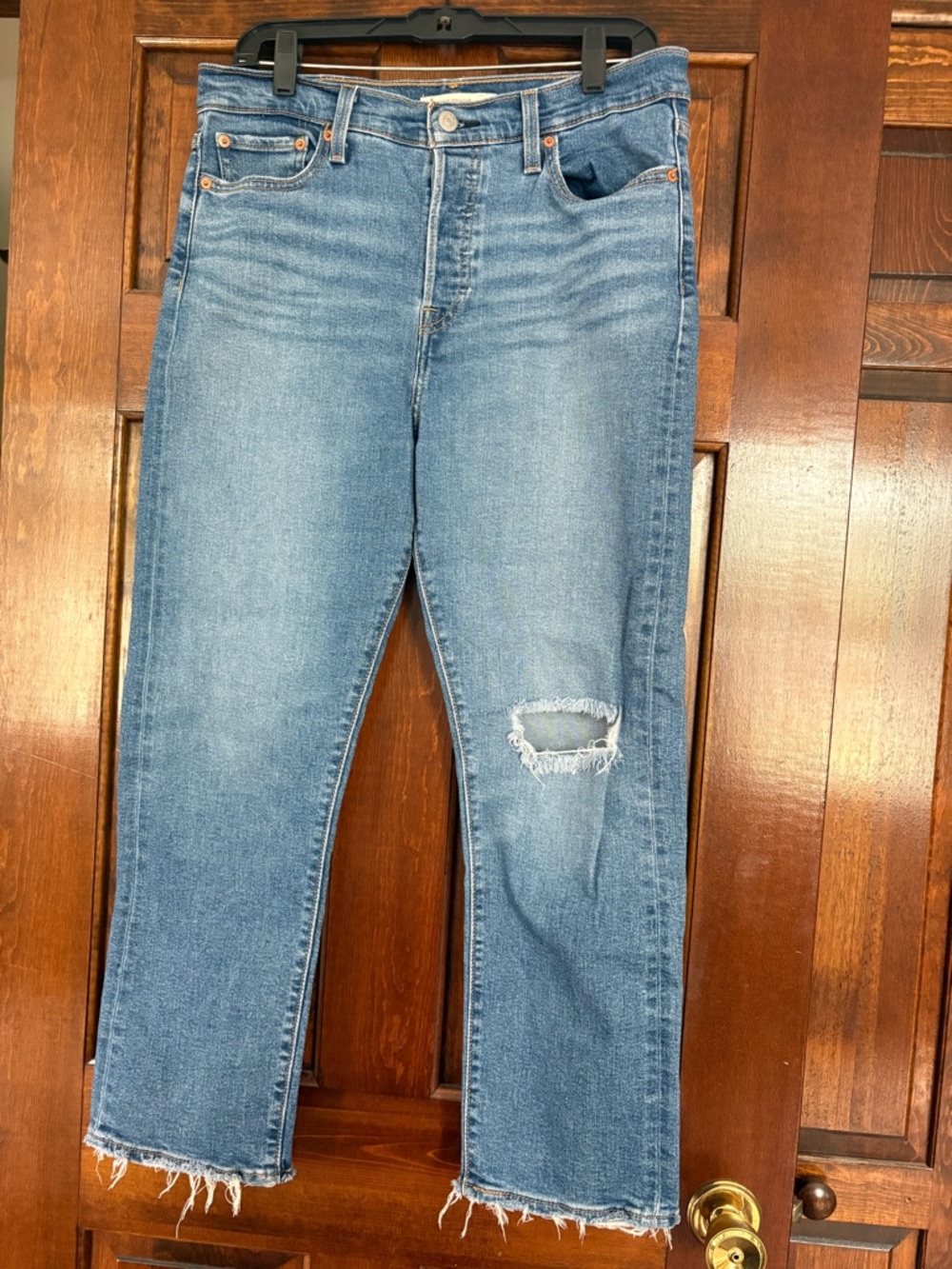 Levi's Light Blue High-Rise Cropped Jeans with Distressed Knee